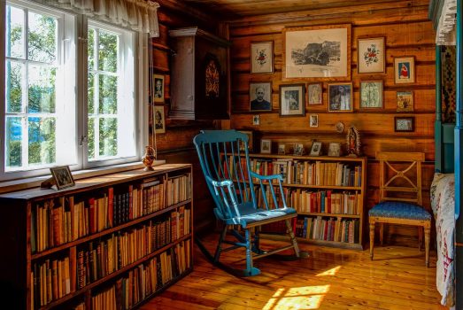 Sigrid Undset rocking chair and books stand as if she is just out for a walk. Photo - Ian Brodie Bjerkebæk